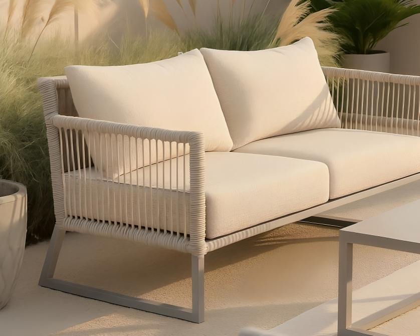 Cream outdoor sofa with Regency outdoor fabric.